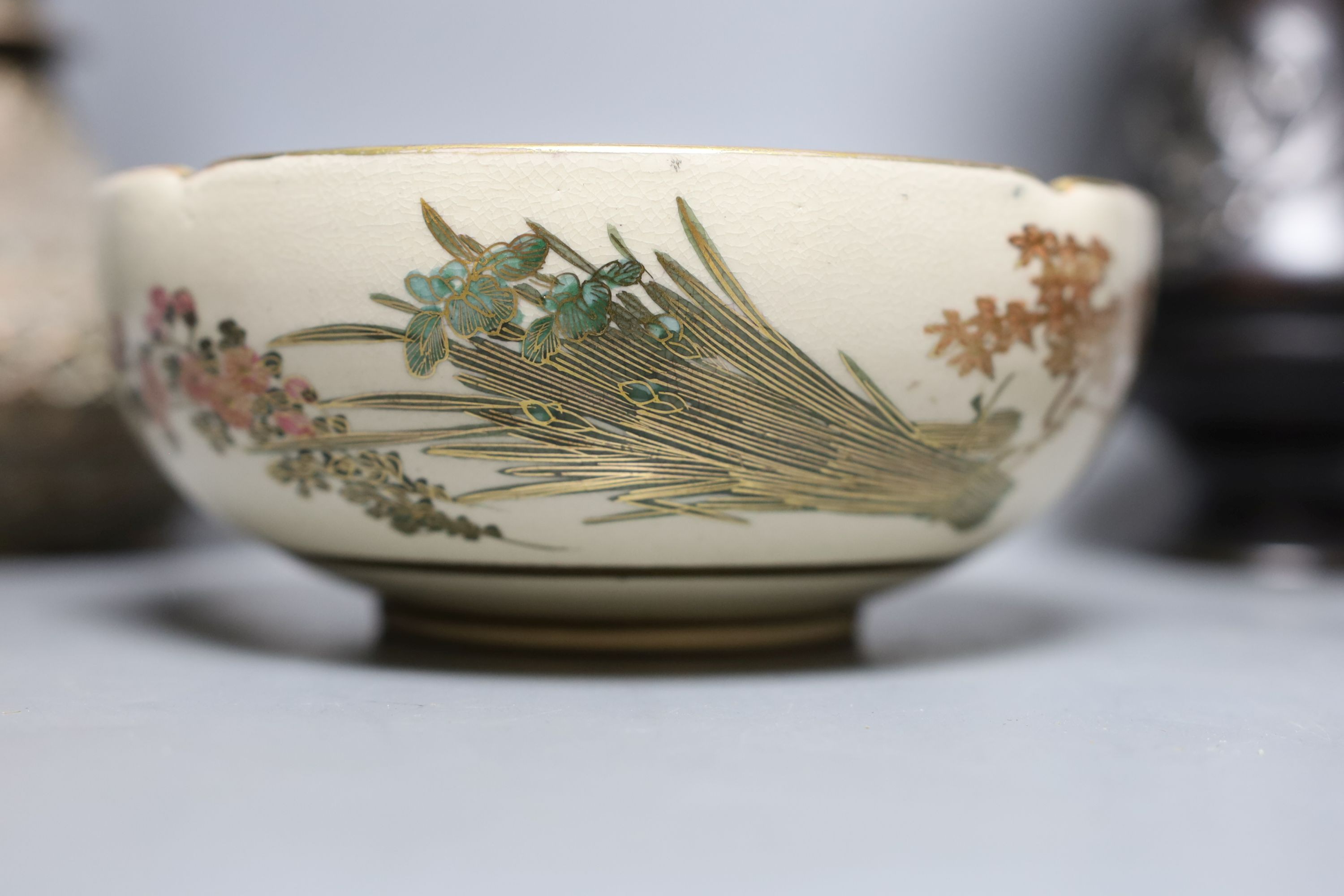 A Japanese bronze vase, an Islamic brass bottle, Chinese enamelled porcelain bowl, bronze group of man riding an ox. 29cm